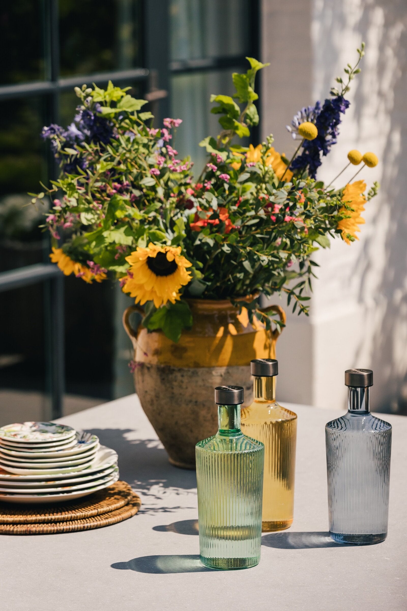Handgemaakt glaswerk van Paveau in drie kleuren.